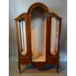A French Kingwood Marquetry Inlaid and Gilt Metal Mounted Vitrine with a domed central door