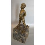 A 20th Century Patinated Bronze Model of a Boy Skiing upon a square variegated marble plinth,
