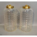 A Pair of Cut Glass and Brass Covered Jars of Circular Form,