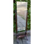 A 20th Century Oak Cheval Mirror with outswept legs