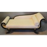 A Regency Ebonised and Gilt Metal Mounted Chaise Longue with scroll ends raised upon outswept legs