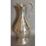 A Victorian Silver Ewer engraved with an Irish Regimental Crest and mounted with shamrocks,