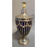 A Silver Plated Covered Urn of Pierced Form with Blue Glass Liner and Pineapple Finial,
