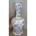 A Large Delft Blue and White Decorated Bottle Neck Vase decorated Birds amongst Foliage, 61.