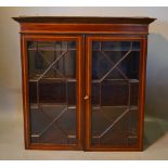 An Edwardian Mahogany Satinwood Inlaid Bookcase Top with two astragal glazed doors enclosing
