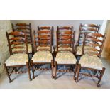 A Set of Eight Oak Lancashire Style Dining Chairs to match the previous lot,