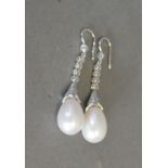 A Pair of 18ct. White Gold Pearl and Diamond Drop Earrings, approximately 0.