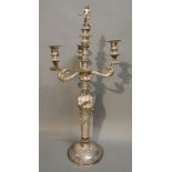 A Continental White Metal Candelabrum with figural surmount and circular base,