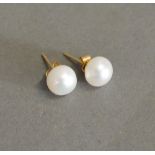 A Pair of 9ct. Gold Cultured Pearl Ear S