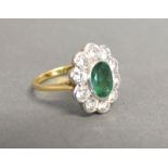 An 18ct. Yellow and White Gold Emerald a