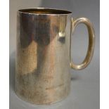 A Continental White Metal Mug bearing in