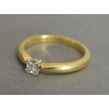An 18ct. Yellow Gold Solitaire Diamond R