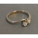 An 18ct. White Gold Two Stone Diamond Ri