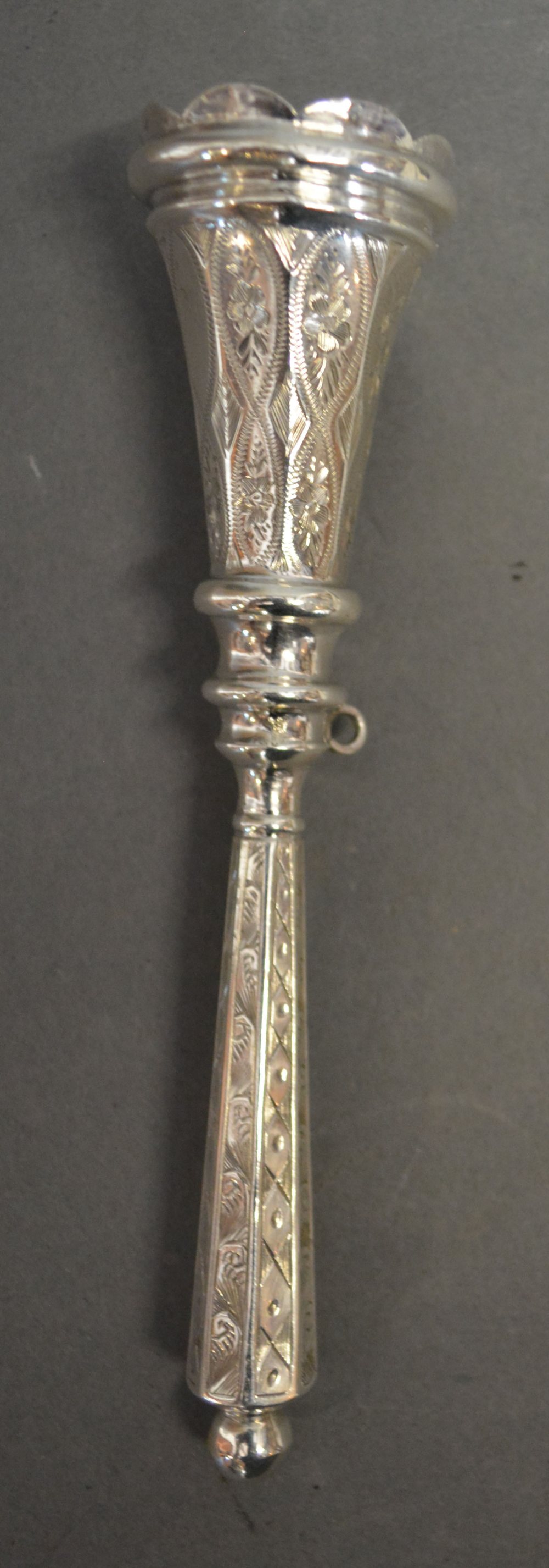 A White Metal Posy Holder with engraved