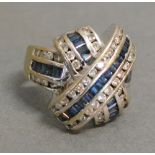 An 18ct. White Gold Diamond and Sapphire