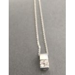 An 18ct. White Gold Diamond Pendant with