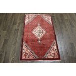 A North West Persian Woollen Rug with a