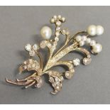 A Gold Spray Brooch set with Diamonds an