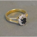 An 18ct. Yellow Gold Sapphire and Diamon