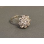 An 18ct. White Gold Diamond Cluster Ring