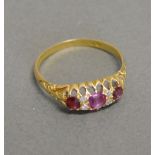 A 15ct. Yellow Gold Ruby and Diamond Ban