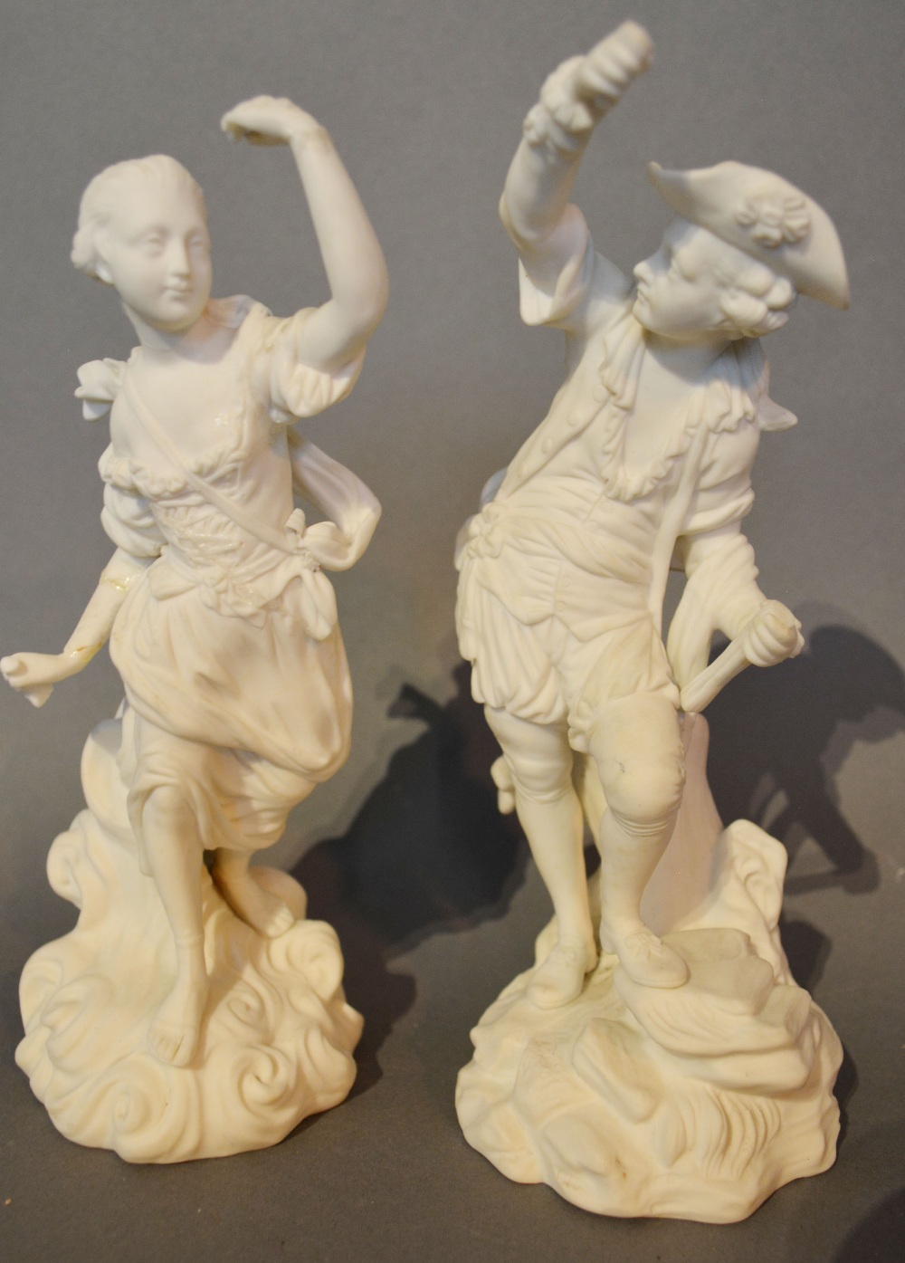 A Pair of Continental Bisque Figures, 20