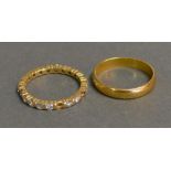 A Gold Diamond Set Eternity Ring, together with a 22 ct. gold wedding band, 4.8 gms all in