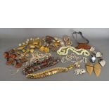 A Collection of Costume Jewellery to include Bead Necklaces, Brooches and other items