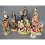 A Collection of Continental Figures to include a German porcelain group of Two Boys Eating Fruit