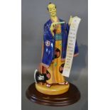 A Royal Doulton Porcelain Figure, Ko Ko HN Number 2898, with oval plinth, 33 cms tall