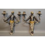 A Pair of Blackamoor Two Branch Wall Lights, 52 cms tall