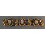 A Bracelet with three oval micro-mosaic panels interlinked with scroll links (a/