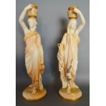 A Pair of Royal Worcester Blush Ivory Large Figures 'The Water Carriers' each in the form of a