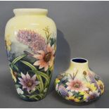 A Moorcroft Style Oviform Vase Tube Lined, together with a similar squat vase