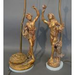 A Pair of Gilt Metal Table Lamps in the form of Classical Figures, 43 cms tall