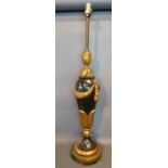 A Regency Style Gilded and Ebonised Large Table Lamp, decorated bows and swags, 90 cms tall