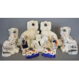 Two Pairs of Staffordshire Models of Spaniels together with five other pieces of Staffordshire