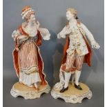 A Pair of Dresden Porcelain Figures of a Lady and Gentleman in Period Dress, decorated in polychrome