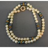 A Pearl Single Strand Necklace with 9ct. Gold Clasp with pearl cluster