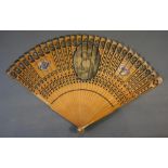 An 18th Century English Brise Fan, decorated with three cartouche and finely carved sticks with