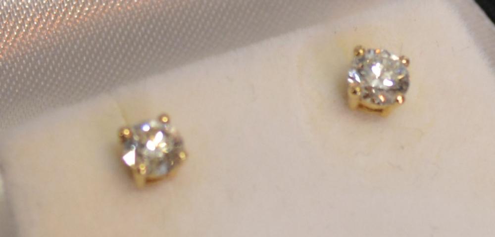 A Pair of 18ct. Yellow Gold Screw Back Diamond Ear Studs, approximately 0.65 ct