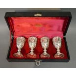 A Set of Four Silver Plated Goblets Bearing Crest within lined case