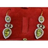 A Pair of Diamond and Peridot Drop Earrings