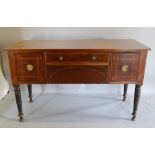 A Regency Mahogany and Satinwood Inlaid Sideboard with two central drawers flanked by cupboard doors