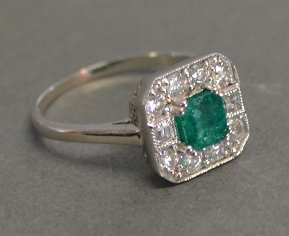 An 18ct. White Gold Art Deco Style Emerald and Diamond Ring