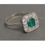 An 18ct. White Gold Art Deco Style Emerald and Diamond Ring