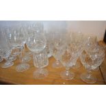 A Large Collection of Cut Glass Drinking Glasses