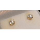 A Pair of 18ct. Yellow Gold Screw Back Diamond Ear Studs, approximately 0.65 ct