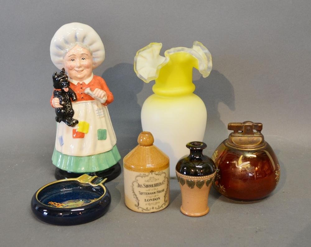 A Carlton Ware Lighter, together with a similar Carlton Ware ashtray, a Royal Doulton figure of