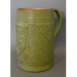 A Royal Doulton Stoneware Large Mug decorated in relief and impressed WTL&S dated 1929, 22cms tall